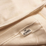 Cream-colored cotton sweater by 40 Winks, featuring a soft texture and cozy design, perfect for casual wear.